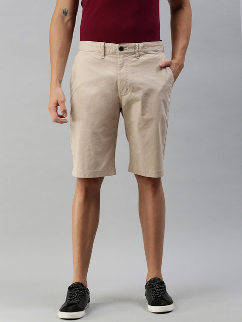 

Tommy Hilfiger Men Beige Solid Regular Fit Chino Shorts