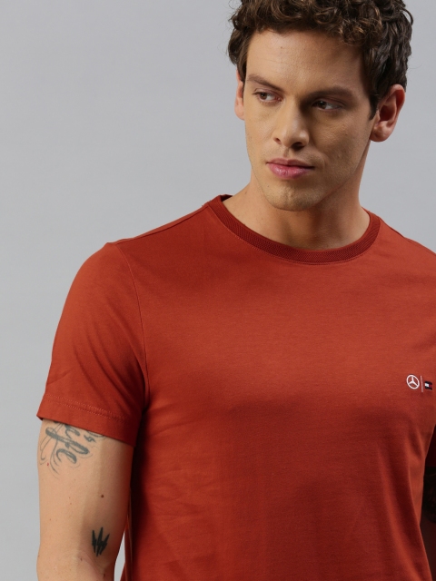 

Tommy Hilfiger Men Rust Orange Solid Round Neck Pure Cotton T-shirt