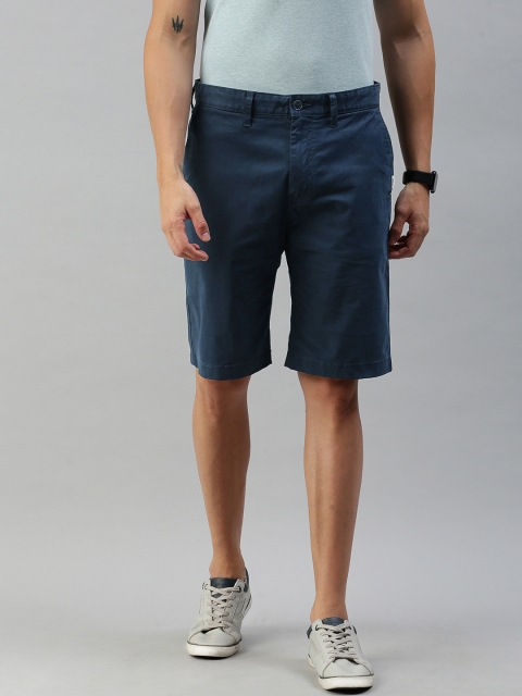 

Tommy Hilfiger Men Navy Blue Solid Regular Fit Shorts