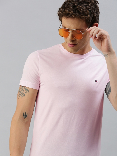 

Tommy Hilfiger Men Pink Solid Round Neck T-shirt