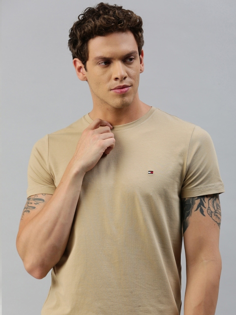 

Tommy Hilfiger Men Camel Brown Solid Round Neck T-shirt