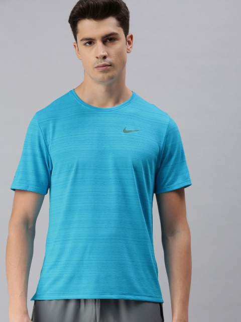 

Nike Men Blue Solid NK DF MILER TOP SS Dri-Fit Round Neck T-shirt