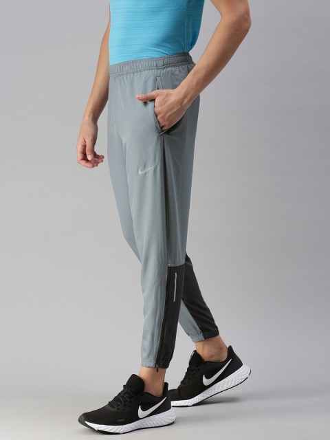 

Nike Men Grey AS M NK ESSENTIAL WOVEN DRI-FIT Running Joggers, Black
