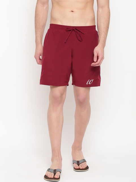 

iO Men Maroon & Black Solid Reversible Swim Shorts