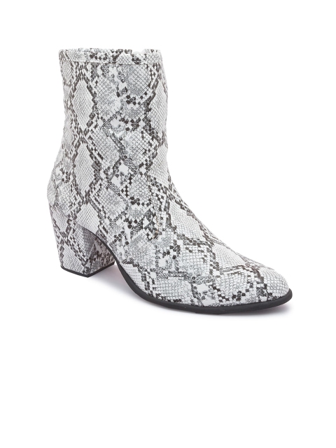 

Sole To Soul Women White Woven Design Heeled Boots