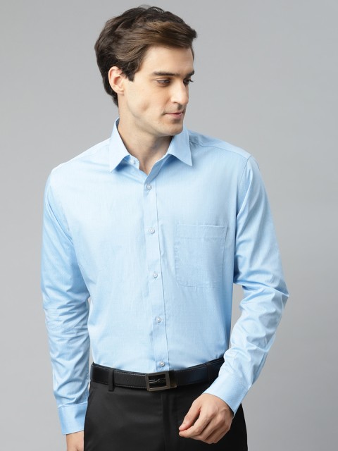 

Raymond Men Blue Pure Cotton Slim Fit Solid Formal Shirt