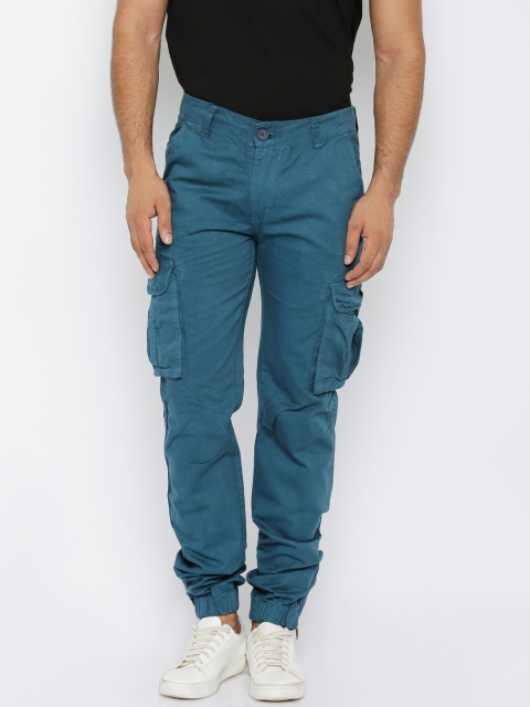

Roadster Men Teal Blue Solid Slim Fit Trousers