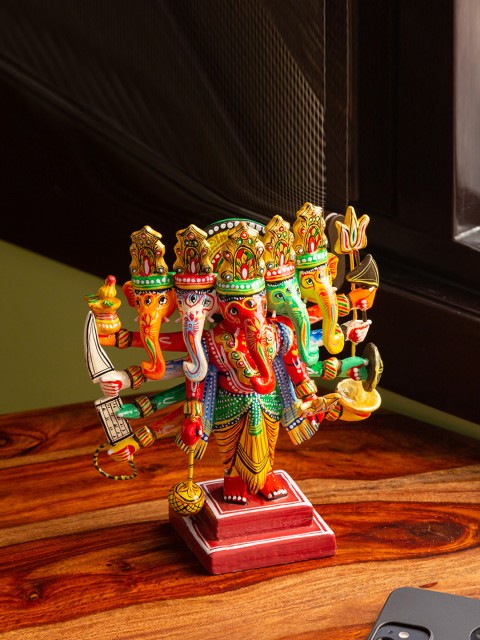 

ExclusiveLane Yellow & Green Hand-Painted & Hand-Crafted Ganesha Showpiece
