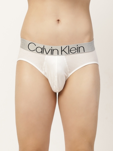 

Calvin Klein Underwear Men White Solid Basic Briefs NEW-NB1564-001-001