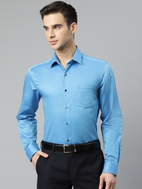 

Arrow Men Blue Pure Cotton Slim Fit Solid Formal Shirt