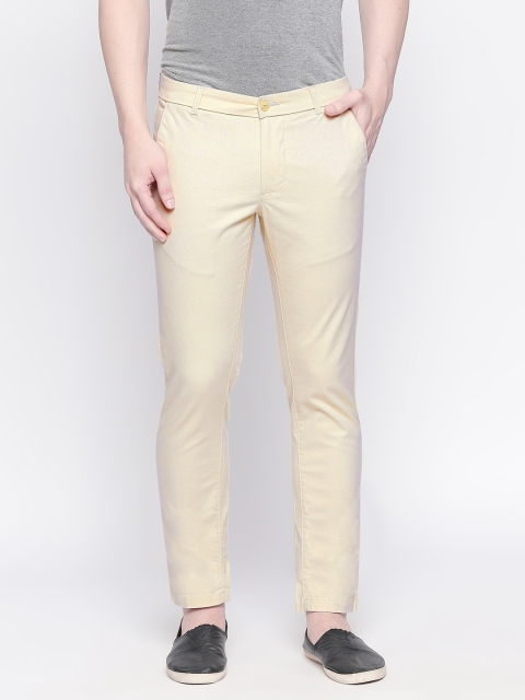 

Basics Men Beige Tapered Fit Solid Regular Trousers