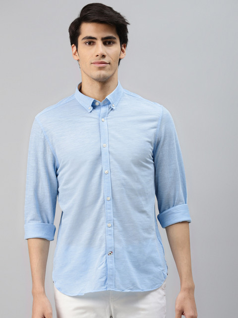 

Tommy Hilfiger Men Blue Solid Slim Fit Casual Shirt