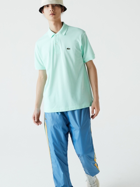 

Lacoste Men Blue Solid Polo Collar T-shirt