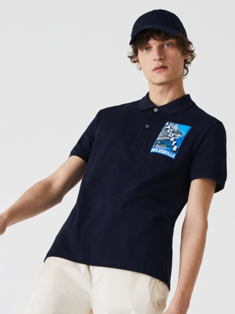 

Lacoste Men Navy Blue Pure Cotton Solid Polo Collar T-shirt