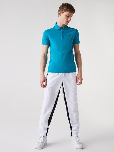 

Lacoste Men Blue Solid Polo Collar T-shirt