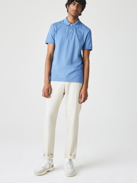 

Lacoste Men Blue Pure Cotton Solid Polo Collar T-shirt
