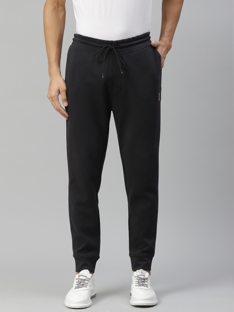 

Tommy Hilfiger Men Black Solid Joggers