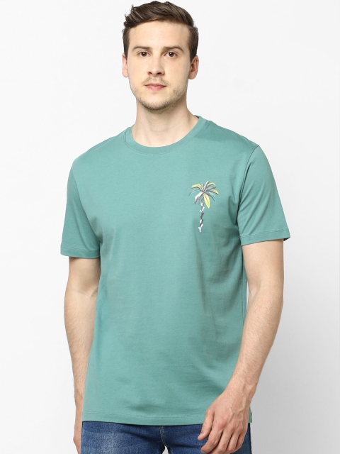 

Celio Men Green Solid Round Neck T-shirt