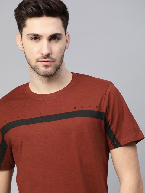 

Roadster Men Rust Red Solid Pure Cotton T-shirt