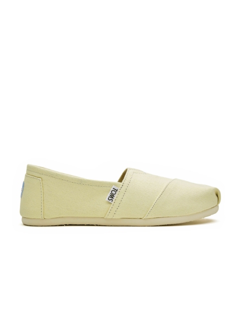 

TOMS Women Cream-Coloured Canvas Slip-Ons