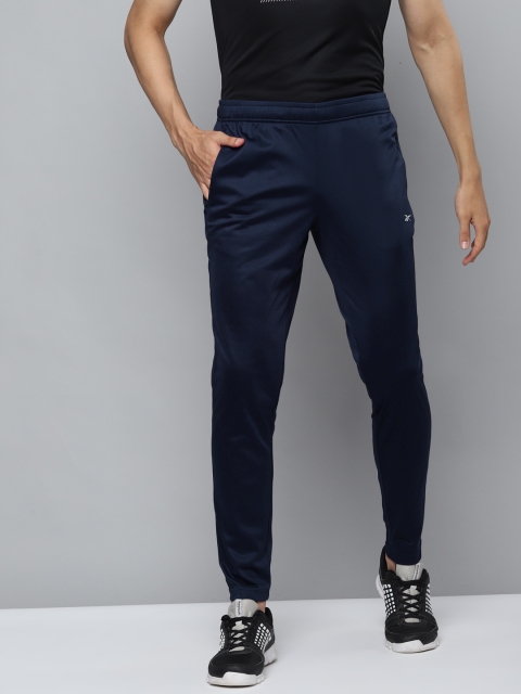 

Reebok Men Navy Blue Solid Tapered Fit Training ENH RD Joggers