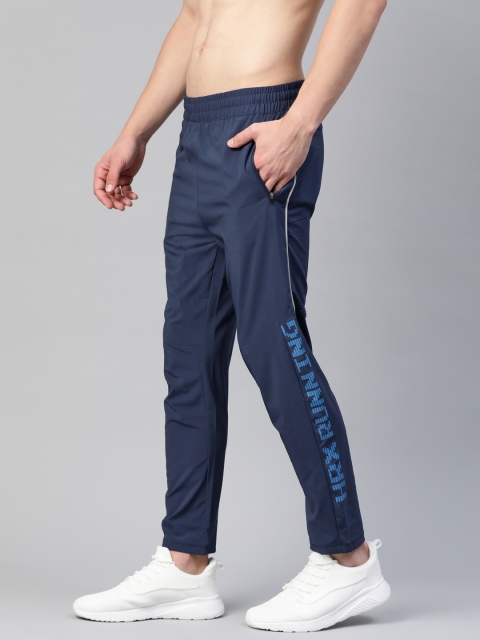 

HRX By Hrithik Roshan Men Medieval Blue Solid Slim Melange Rapid-Dry Running Track Pants, Navy blue