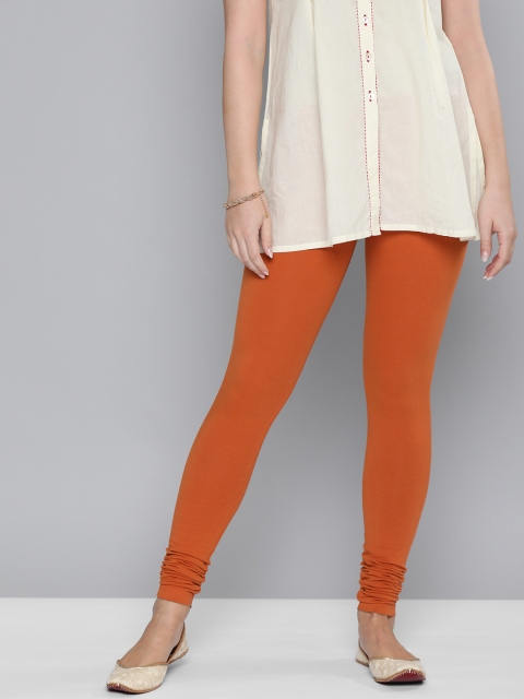 

HERE&NOW Women Orange Solid Churidar Length Leggings