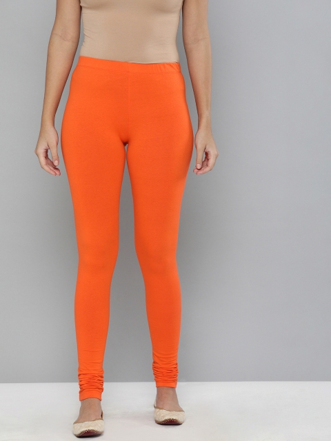 

HERE&NOW Women Orange Solid Churidar-Length Leggings