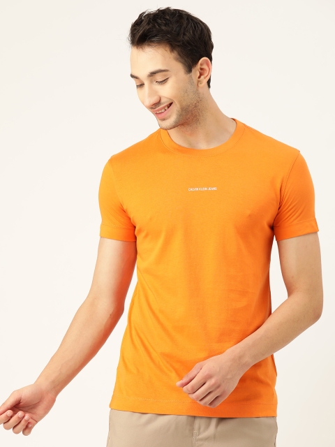 

Calvin Klein Jeans Men Orange Brand Logo Pure Cotton T-shirt