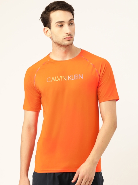 

Calvin Klein Jeans Men Orange Brand Logo Printed T-shirt