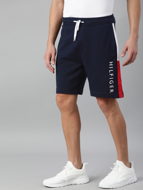 

Tommy Hilfiger Men Navy Blue Brand Logo Print Mid-Rise Regular Shorts
