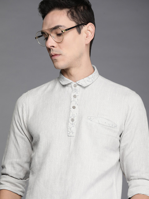 

Ethnix by Raymond Men Beige Printed Collar Kurta