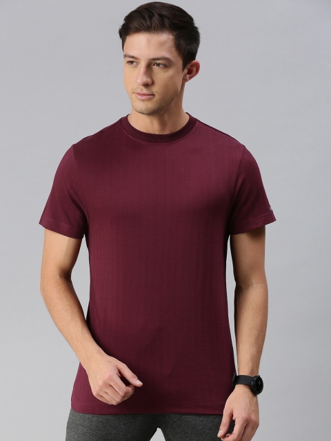 

Arrow Sport Men Maroon Self Design Round Neck T-shirt