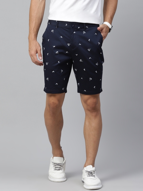 

Mast & Harbour Men Navy Blue & White Conversational Printed Mid-Rise Regular Shorts