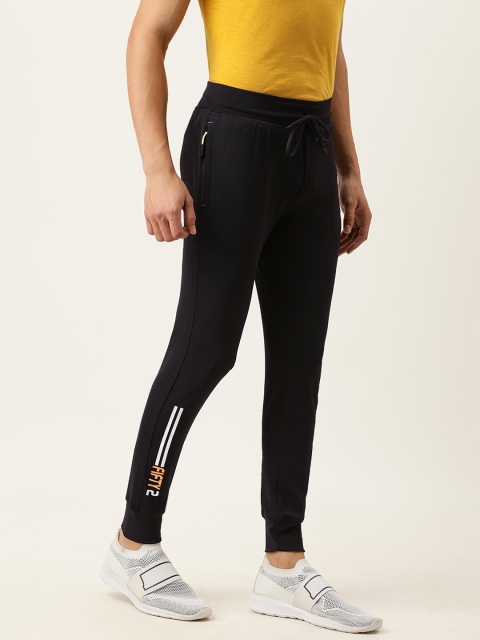 

Sports52 wear Men Black Solid Joggers with Printed Detail