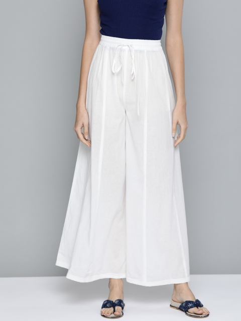 

HERE&NOW Women White Solid Pure Cotton Flared Palazzos
