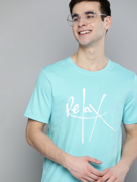 

Mast & Harbour Men Blue & White Cotton Handcrafted Typography Printed T-shirt