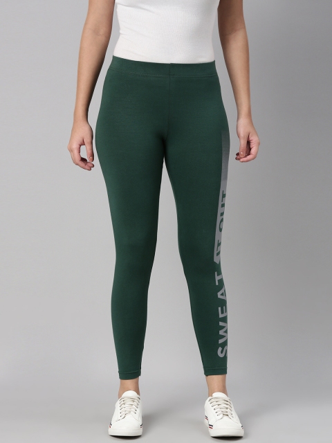 

abof Women Green Solid Cotton Ankle- Length Leggings With Prnted Sides