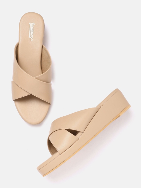 

Roadster Beige Solid Wedges