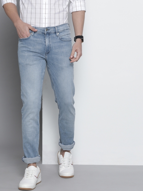 

Tommy Hilfiger Men Blue Sage Fitted Slim Fit High-Rise Heavy Fade Stretchable Jeans