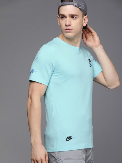 

Nike Men Blue Solid CLUB ESSENTIALS Pure Cotton T-shirt