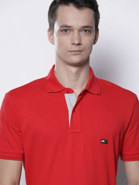 

Tommy Hilfiger Men Red Solid Polo Collar T-shirt