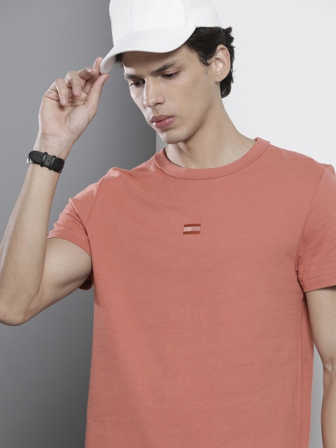 

Tommy Hilfiger Men Coral Orange Solid Recycled Pure Cotton T-shirt