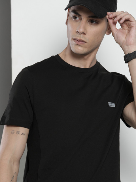 

Tommy Hilfiger Men Black Solid Pure Cotton T-shirt