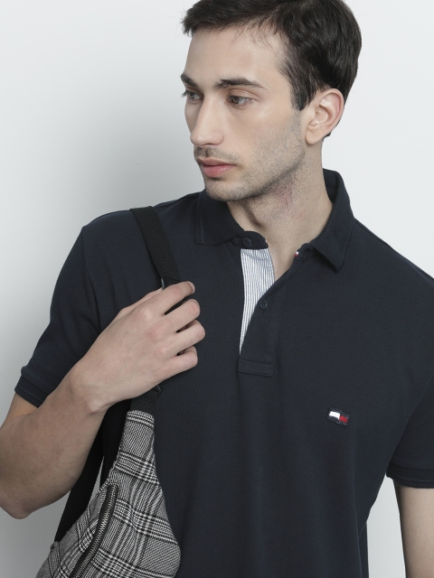 

Tommy Hilfiger Men Navy Blue Solid Polo Collar T-shirt