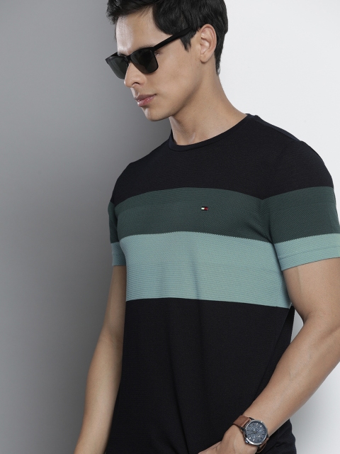 

Tommy Hilfiger Men Navy Blue & Sea Green Colourblocked T-shirt