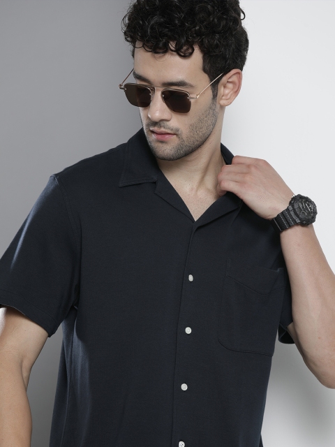 

Tommy Hilfiger Men Navy Blue Solid Casual Shirt