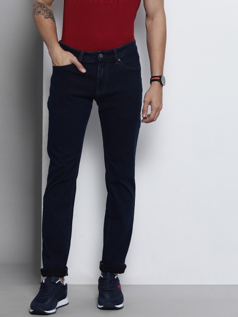 

Tommy Hilfiger Men Blue Slim Fit Mid-Rise Clean Look Stretchable Jeans