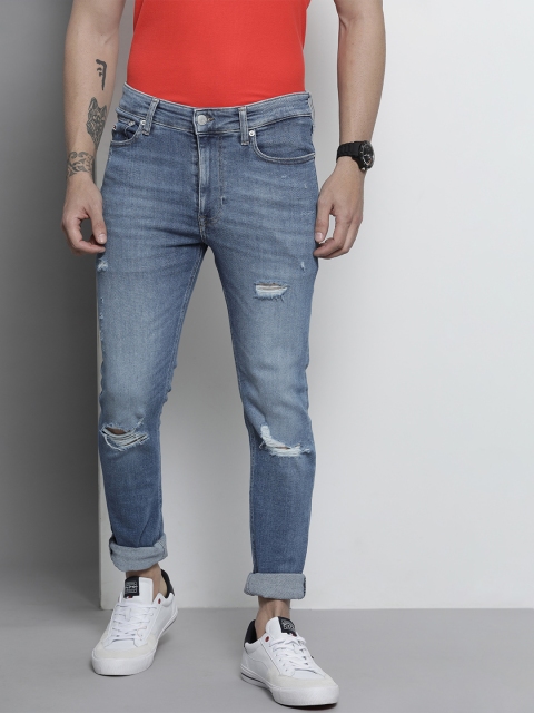 

Tommy Hilfiger Men Blue Skinny Fit Highly Distressed Light Fade Stretchable Jeans