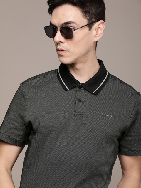 

Calvin Klein Jeans Men Black Self-design Polo Collar T-shirt
